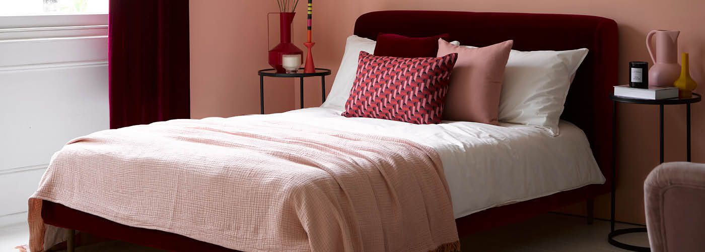 pink furnished bed in bedroom